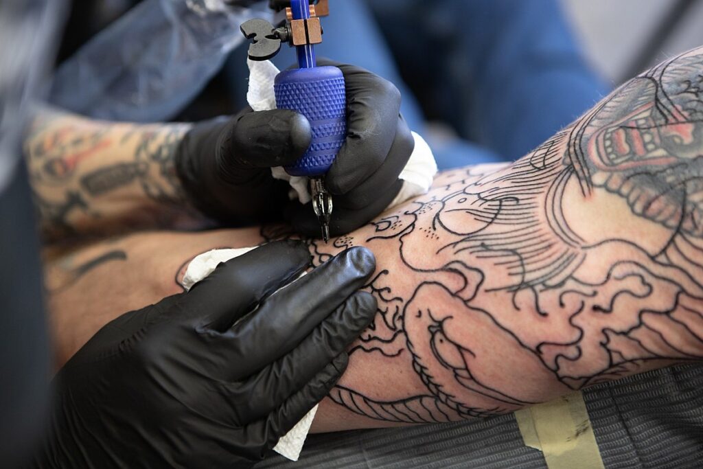 Realism Tattoos Artist Raising Body Workmanship