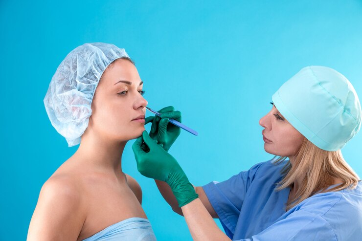 cosmetic surgeon examining female client office 124865 1803